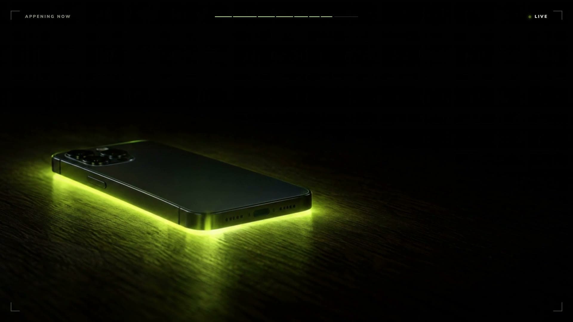 A phone lying face down on a dark desk, lime light spilling from under it.